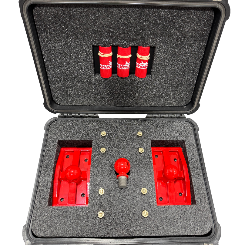 Black hard-shell case with red components and tools on a white background