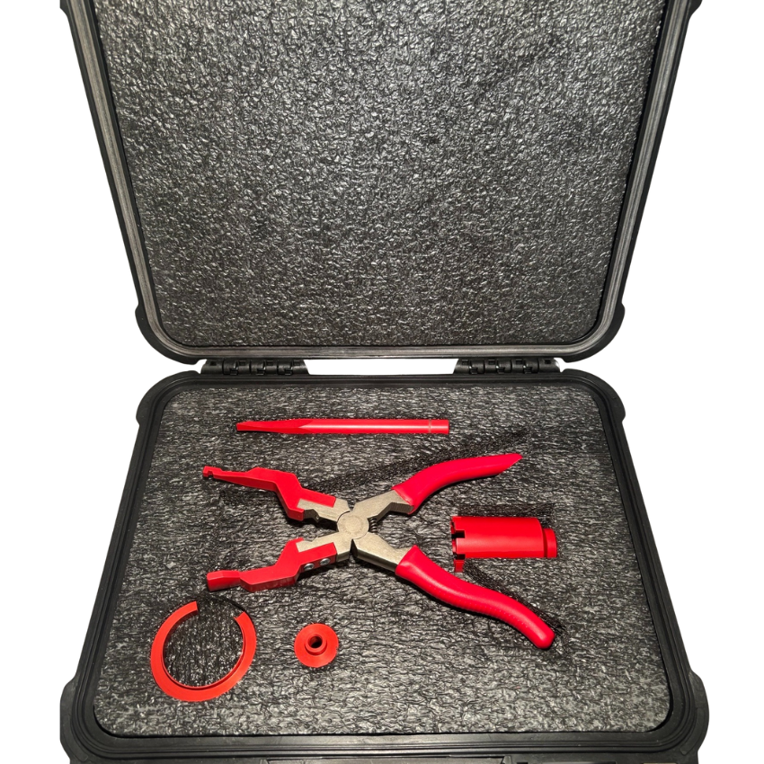 Augusta AW109SP TR Tooling. Red pliers and tools in a black and gray case on a white background